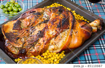 Dish with baked in oven gammon of bacon with garbanzo Dish with baked in oven gammon of bacon with garbanzo 85110987