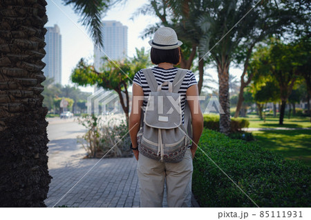 young stylish hipster Asia woman walking on the street young stylish hipster Asia woman walking on the street 85111931