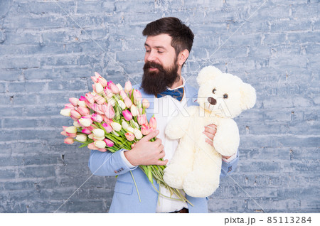 Thank you. Spring gift. Bearded man hipster with spring 85113284