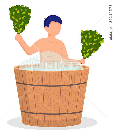 Young man sitting in tub washing his body in sauna. Bathhouse, guy in barrel is resting in sauna 85114573