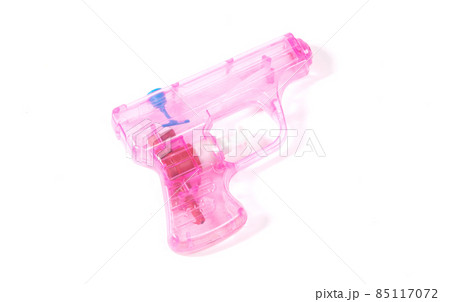 SImple pink small water pistol isolated on white SImple pink small water pistol isolated on white 85117072