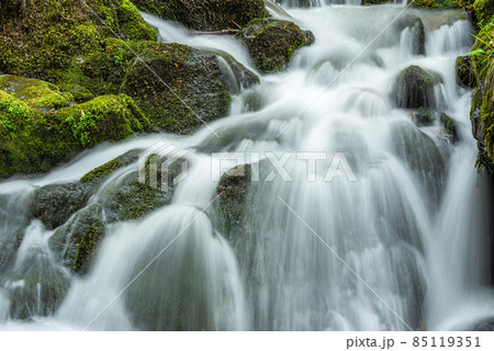 Waterfall on a mountain stream in spring. Vosges, France, Europe. 85119351