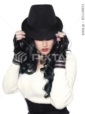 Woman With Sweater and Fedora on White Background 85119853