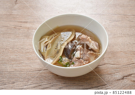 boiled slice Chinese bamboo shoot with pork bone and mushroom soup on bowl 85122488