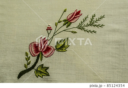 Embroidered twig with small roses and bud, coniferous twig and red berries on white cotton fabric Embroidered twig with small roses and bud, coniferous twig and red berries on white cotton fabric 85124354