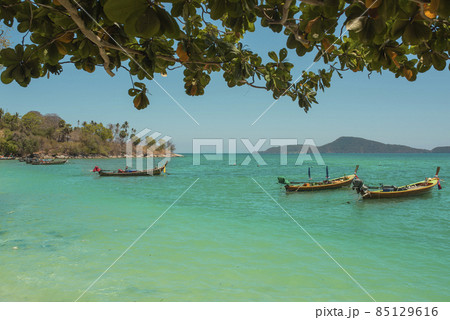 Fishing boats on the coast of the sea in Thailand on the island of Phuket 85129616