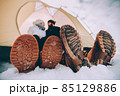 close up male and female winter shoes. 85129886