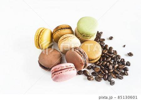 Heap of traditional french macaroons pastel toned on white background 85130601