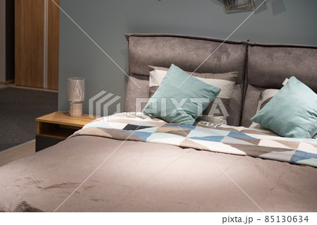 beautiful bedroom interior with linens 85130634