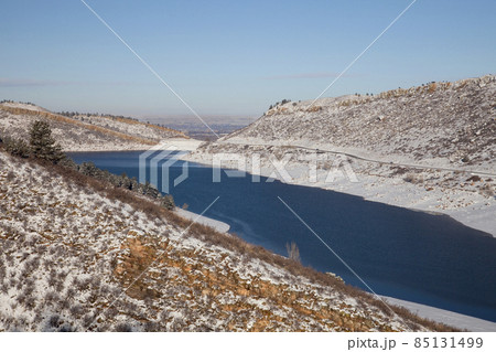 mountain reservoir in winter scenery 85131499