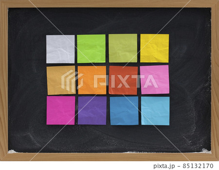 colorful sticky notes on blackboard 85132170