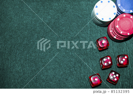 casino chips dice green table. High quality photo 85132395