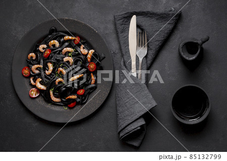 delicious top view black shrimp pasta soy sauce. High quality photo 85132799