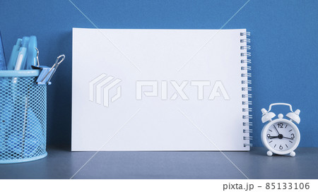 spiral notepad stationery round alarm clock. High quality photo spiral notepad stationery round alarm clock. High quality photo 85133106