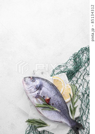 fresh sea bream fish green fish net. High quality photo fresh sea bream fish green fish net. High quality photo 85134312