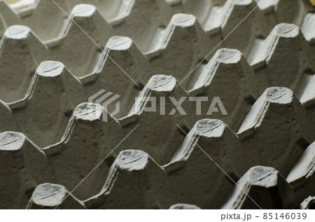 Close up empty egg tray. Paper pack for eggs 85146039