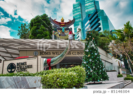 Christmas decorated Dinosaur sculpture at the entrance of BDMS Wellness Clinic 85146304