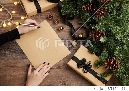 Woman Writing Christmas Letter Woman Writing Christmas Letter 85151141