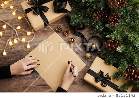 Woman Writing Christmas Letter Woman Writing Christmas Letter 85151142