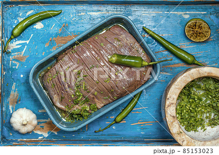 Process of cooking tacos with grilled flank beef steak with handmade guacomole Process of cooking tacos with grilled flank beef steak with handmade guacomole 85153023