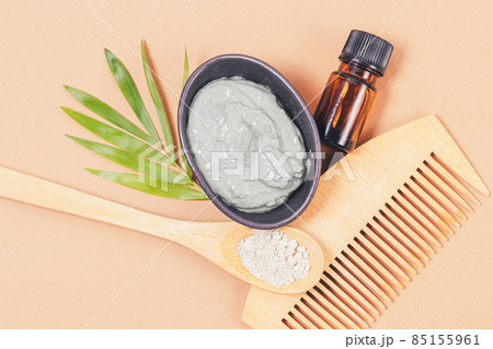Homemade cosmetic hair mask made of clay with essential oil 85155961