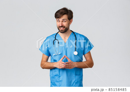 Healthcare workers, coronavirus quarantine campaign and pandemic concept. Professional physician explain patient how to prevent disease or catching covid, neccesity stay home, wear scrubs 85158485
