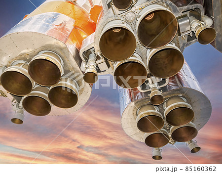 Space rocket engines of the russian spacecraft over blue sky background Space rocket engines of the russian spacecraft over blue sky background 85160362