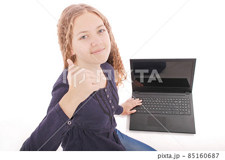 Happy student teenage girl with laptop Happy student teenage girl with laptop 85160687
