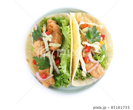 Yummy fish tacos isolated on white, top view Yummy fish tacos isolated on white, top view 85161733
