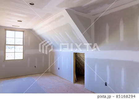 Laid plastering gypsum on the walls and ceiling of a newly built house Laid plastering gypsum on the walls and ceiling of a newly built house 85168294