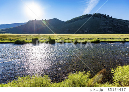 USA, Idaho, Stanley, Early morning sun reflecting in Salmon River 85174457