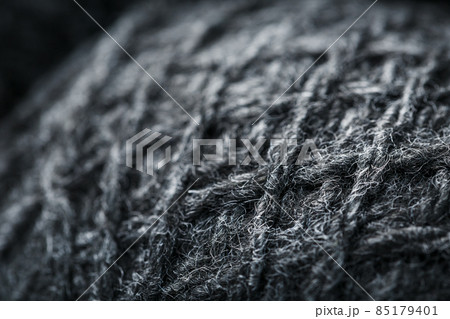 Gray threads of natural wool close-up in full screen. Gray threads of natural wool close-up in full screen. 85179401