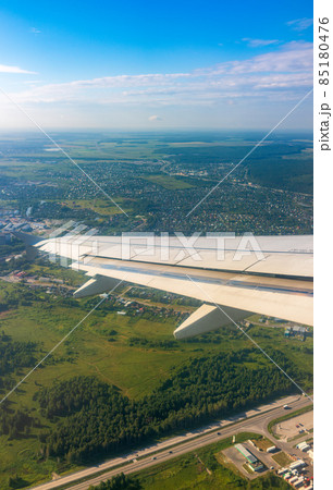 View from the airplane window during taking off on a clear summer morning. Yekaterinburg, Russia View from the airplane window during taking off on a clear summer morning. Yekaterinburg, Russia 85180476