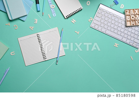 Top view empty notebook and various stationery on blue background. Back to school concept. 85180598