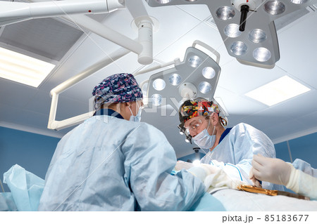 A team of surgeons is fighting for life, for a real operation, for real emotions. The intensive care team is fighting for the life of the patient. Saving life, the struggle for life A team of surgeons is fighting for life, for a real operation, for real emotions. The intensive care team is fighting for the life of the patient. Saving life, the struggle for life 85183677