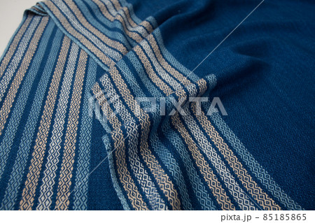 Close up of texture of hand woven stripe shawl 85185865
