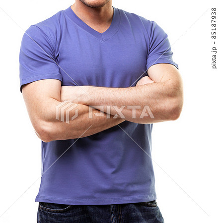 Trendy color 2022 tshirt on young man with crossed arms template on white background 85187938