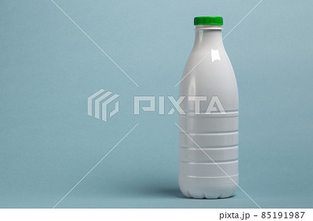 One paper bottle milk on blue background One paper bottle milk on blue background 85191987