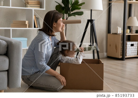 Happy mom and little daughter kid playing sailors Happy mom and little daughter kid playing sailors 85193733