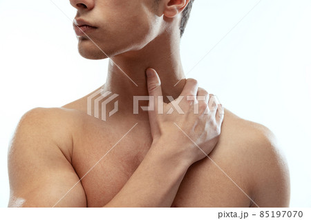 Close-up male sportive body, bust isolated on white studio background. Natural beauty concept Close-up male sportive body, bust isolated on white studio background. Natural beauty concept 85197070