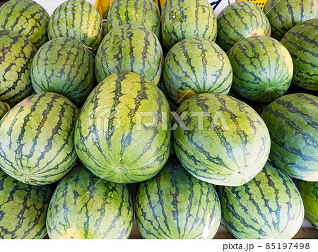 Fresh organic watermelons on the market place 85197498