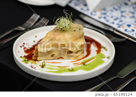 Francesinha, traditional Portuguese sandwich originally from Porto. Served in a restaurant Francesinha, traditional Portuguese sandwich originally from Porto. Served in a restaurant 85199124