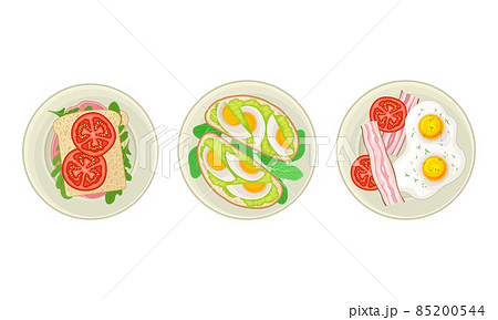 Traditional breakfast dishes set. Top view of eggs, sandwiches and ham served on plates vector illustration 85200544
