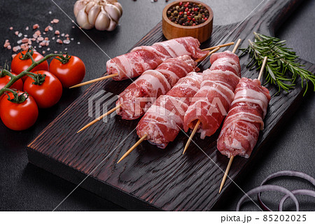 A delicious dish of pork mince wrapped with delicious pieces of bacon A delicious dish of pork mince wrapped with delicious pieces of bacon 85202025