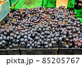 Fresh Grapes for sale at vegetable market, close up. Boxes full of grapes in shop. Grapes at the greengrocer's stall. 85205767