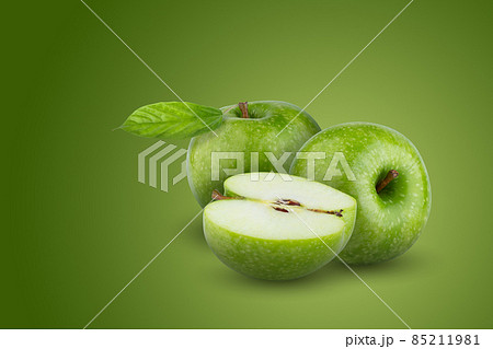 Fresh green apple isolated on green background. Fresh green apple isolated on green background. 85211981