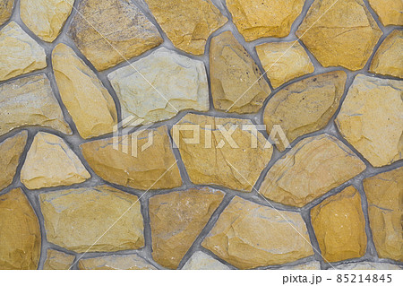 Different sizes of sand stones. Stone wall pattern background Different sizes of sand stones. Stone wall pattern background 85214845