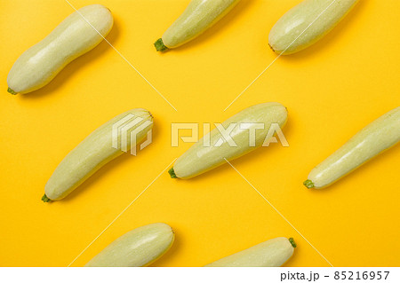Vegetables abstract background. Zucchini on the white 85216957