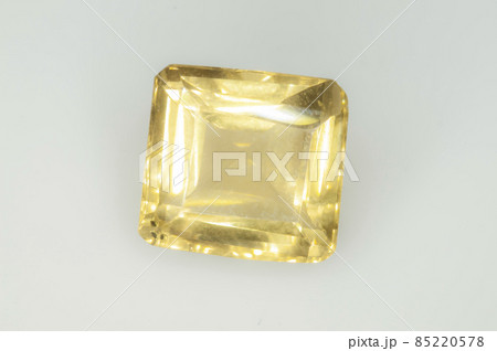 Natural yellow citrine on the white backgound Natural yellow citrine on the white backgound 85220578