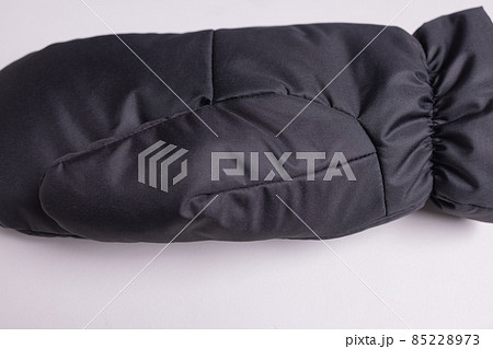 Winter knitted woolen gloves on isolated white background. Winter knitted woolen gloves on isolated white background. 85228973